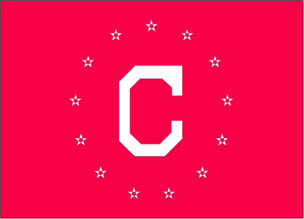 The flag of Cuba with a red star on it displayed against a gray background.