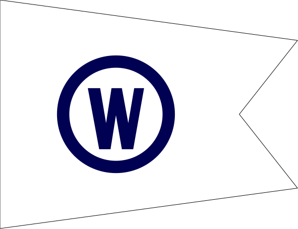 The flag of Western Australia with a compass rose on it flying over an ocean scene.