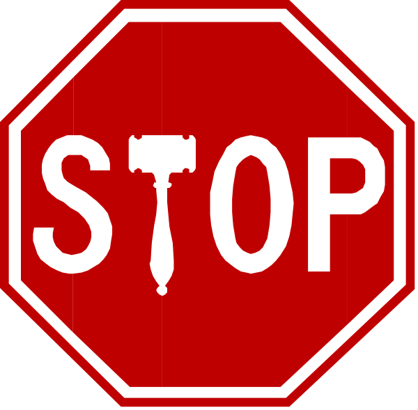 The image shows a red stop sign with white text that reads "STOP" on both sides of it, placed next to another smaller red octagonal sign featuring an illustration of a hammer inside a circle.