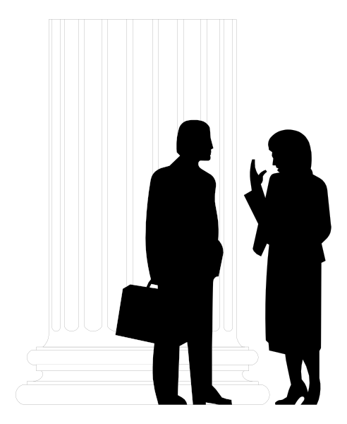 The black silhouette of a man standing with his back to us on an open doorstep at nighttime.