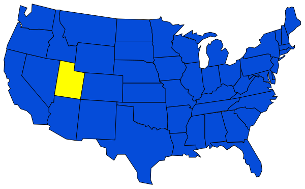The image shows a stylized map of the United States with blue states highlighted against a black background; it is labeled "USA" at top left corner and includes an inset showing Alaska's location within Canada, indicating that this clip-art represents all 50 U.S. states plus Washington D.C., as well as their geographical positioning relative to each other on the globe. The map does not depict any people or animals; it is a simple representation of state boundaries and locations without additional detail about cities, topography, bodies of water, etc.