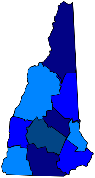 The map shows a state with counties colored blue and purple on top of each other against a gray background; it is labeled "Vermont" at the bottom left corner in white text.