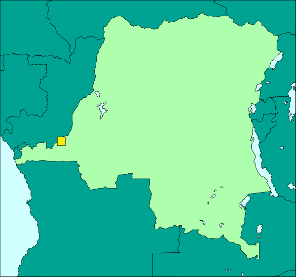 The map shows a country with its capital marked by an icon indicating it's the seat of government; there is also another smaller area highlighted in green within this larger region.