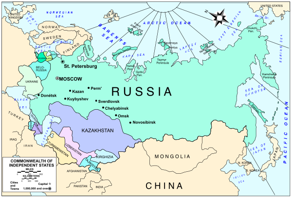 The map shows Russia with its neighboring countries labeled on it; there's a legend at bottom right indicating different types of territories such as republic states, autonomous regions, etc.; two small insets show maps within each other depicting specific areas like Moscow and St Petersburg.