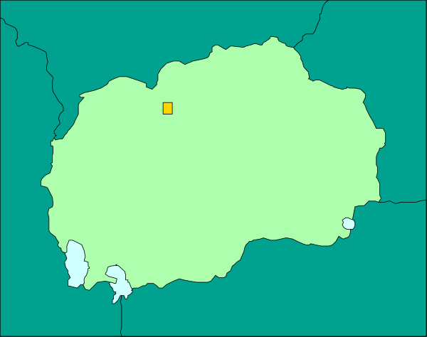 The map shows a country with borders outlined by green lines on top of an aqua background; there is no text present in this image.