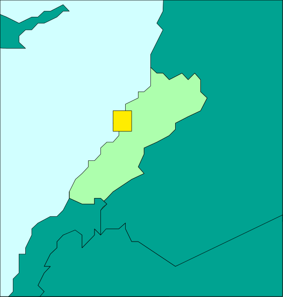 The map shows a region with various shades of green indicating different levels of vegetation cover; there is an area highlighted in yellow near what appears to be water on one side, suggesting some sort of focus or importance for that particular location within this context.