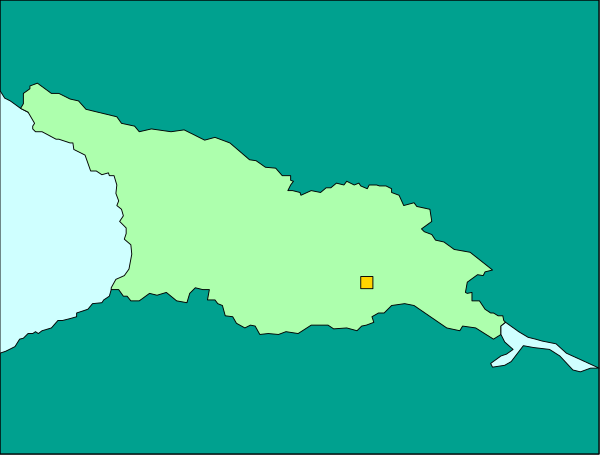 The image shows a map with two distinct regions highlighted: Haiti on top left corner of island is colored green while Dominican Republic occupies most of the rest of the landmass in blue coloring.