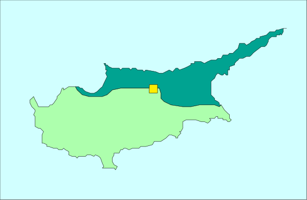 The map shows a stylized representation of Greece with its various regions labeled; it is overlaid on top of another image that appears to be an infrared satellite photo showing landmasses without vegetation, possibly indicating deforested areas.