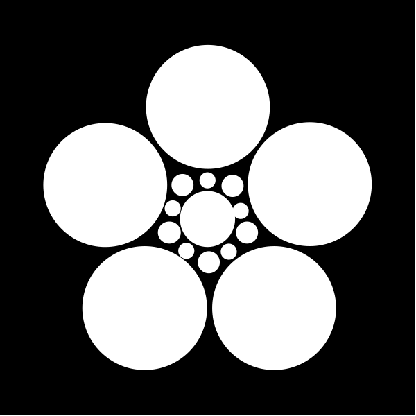 The black and white logo features a stylized flower with six petals arranged around an inner circle of concentric circles that resemble sun rays emanating from it.