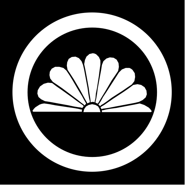 The logo of a television network with an emblem that resembles a stylized sunburst above it on top left corner.
