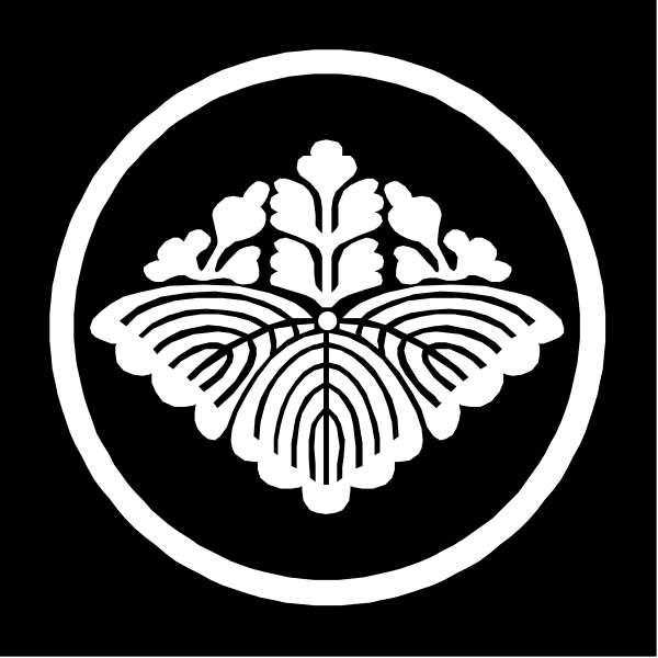 The logo of a Japanese company with an emblem that resembles a flower on top inside a circle.