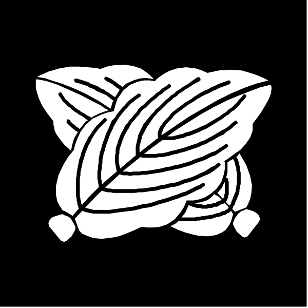 The logo features a stylized emblem with two leaves on either side of what appears to be an abstract design resembling a flower in between them; above this central motif is another leaf-like shape, and below it there's text that reads "Gestaltung," which translates from German as 'creation.'