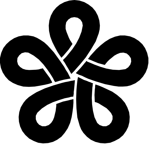 The black and white photo shows a person standing on top of an elephant with its trunk raised upwards towards something above it in front of them.