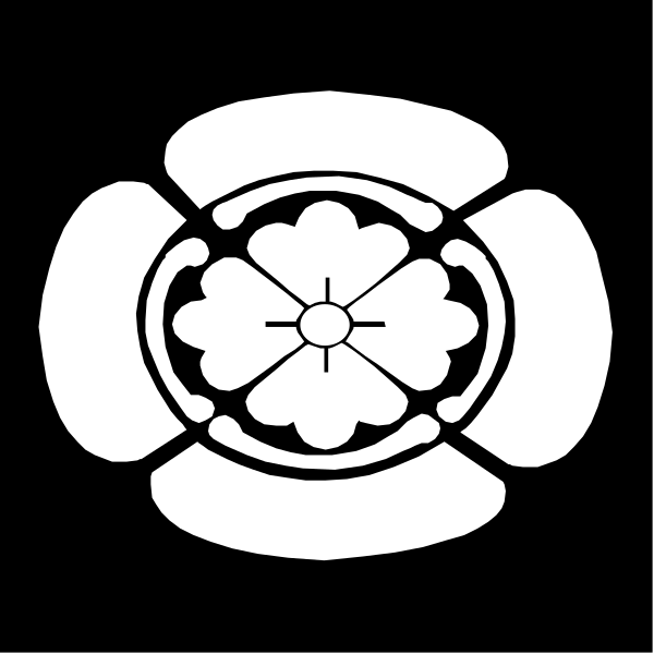 The black and white logo features a stylized flower with six petals arranged around an inner circle that contains three smaller circles in descending order of size; atop this arrangement is another circular motif resembling a crest, which has two vertical lines intersecting to form the shape.