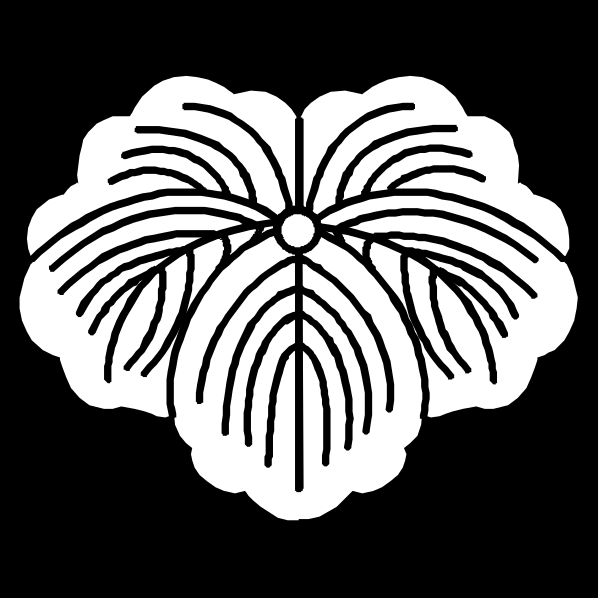 The black and white logo features a stylized flower with six petals on top of two leaves to its left side.