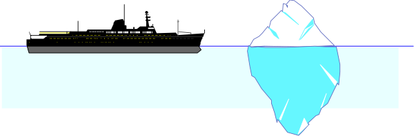The image shows a blurry scene with an object that appears to be blue on its side against what looks like a dark background; it's difficult to discern specific details due to low resolution.