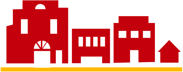 The image shows a pixelated representation of an urban scene with buildings that resemble houses on either side of what appears to be a street lined by brick walls; there is no text present in this small clip-art image, and it does not depict any people or animals.