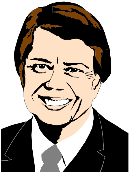 The image shows a man with dark hair smiling at something off camera; he is wearing glasses and has facial stubble. He appears to be in his 40s-50s age range. There's no text present, so there aren't any words or phrases that can be described here. This description focuses on the objects within the image: a man with dark hair smiling at something off camera; he is wearing glasses and has facial stubble. He appears to be in his 40s-50s age range. There are no other people, animals, actions