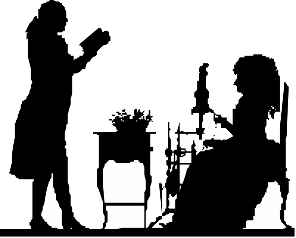 The black and white photo shows a person sitting at an indoor table with their back to us; there is no other discernible detail in this image due to its small size.