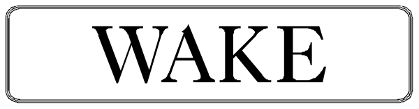 The image shows a sign with text that reads "WAKE" on it against an indistinct background.