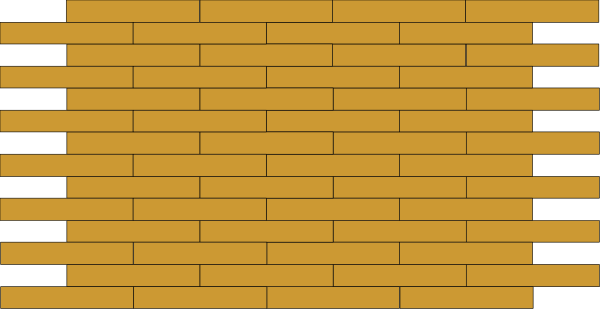 The image shows a brick wall with black bricks on top of yellow ones.