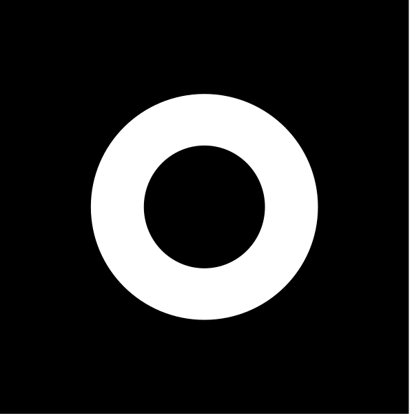 The image shows a black circle with white lines forming an oval shape against a dark background.