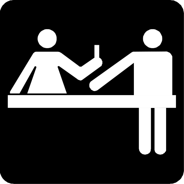 The black and white icon shows a man standing at an information desk with his hand on it while another person is seated across from him in front of what appears to be a countertop; both individuals seem engaged in conversation, possibly indicating customer service interaction within a public or commercial setting such as a hotel lobby.