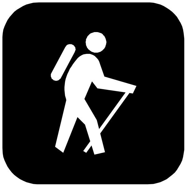 The black silhouette of a person walking with backpacks on their back under an umbrella against white background
