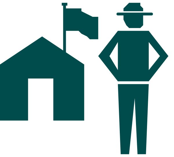 The image shows a stylized icon of three figures: two standing side by side with silhouettes that suggest human forms wearing hats; one figure is holding what appears to be an American flag in their right hand, and there's another smaller house-like structure behind them on the left.