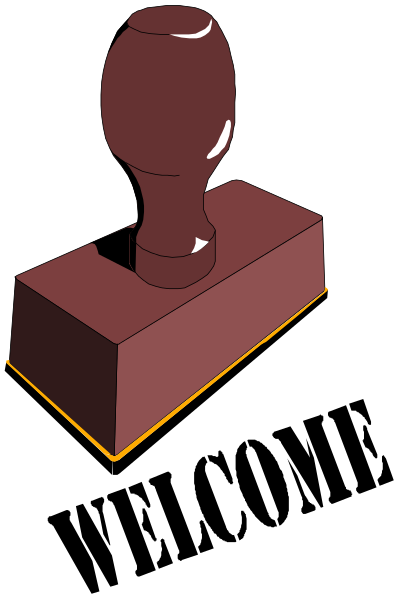 The image shows a red lever handle on top of an object that appears to be made out of wood with two visible sides: one brown side facing upwards in front of another darker-colored side at the bottom, which is partially obscured by shadow and not fully shown; there are no other objects or people present.