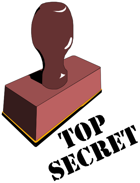 The image shows a red brick with an imprinted stamp on it against a black background.