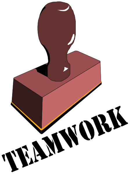 The image shows a red brick with two nails sticking out of it on top against a black background.
