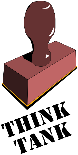 The image shows a red block with an object on top of it against a black background.
