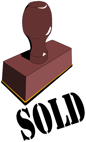 The image shows a red lever handle on top of a wooden block with two visible sides against a black background.