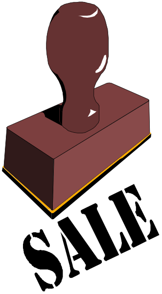 The image shows a red brick with an object that resembles a keyhole on top of it against a black background.