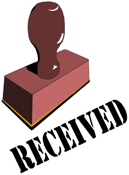 The image shows a red brick with an object that resembles a hammer on top of it against a black background.