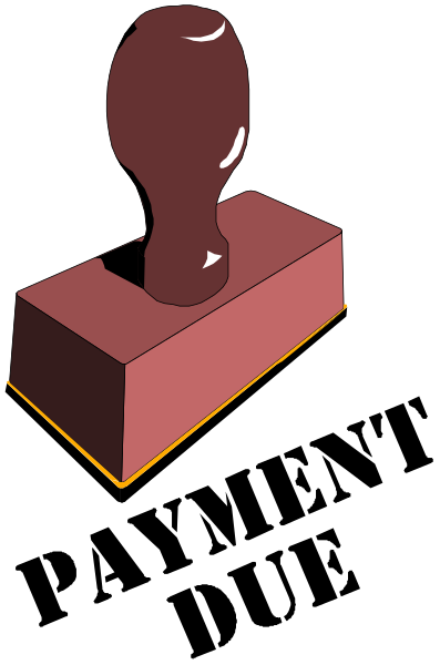 The image shows a red brick with an object on top of it that resembles a keyhole cover.