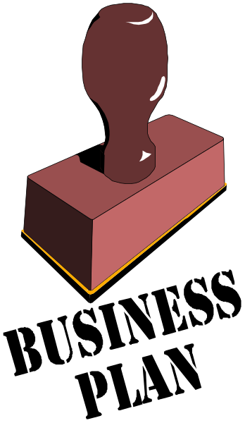 The image shows a red block with an abstract shape on top of it against a black background.