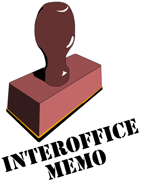 The image shows a red brick with an engraved metal stamp on top of it against a black background.
