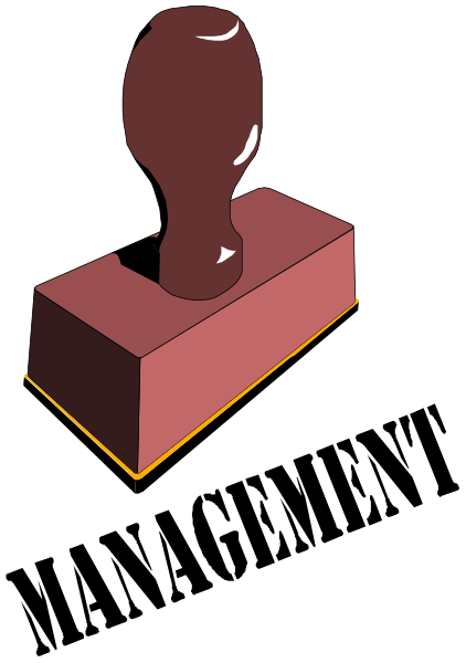 The image shows a red brick with an imprinted stamp on it against a black background.