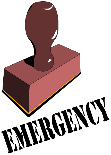The image shows a red brick with an object that resembles a bottle opener on top of it against a black background.