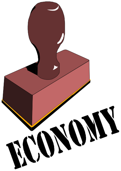 The image shows a red brick with an object on top of it that resembles a bottle opener lying horizontally across its surface against a black background.