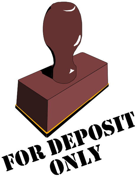 The image shows a red block with an indentation on top of it to represent a hammer head resting against a black background that has white lines indicating dimensions for cutting out shapes in paper crafting projects.