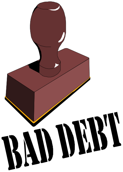 The image shows a red wooden block with an engraved handle on top of it against a black background.