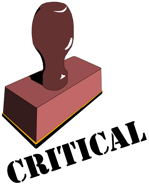 The image shows a red brick with an illustration of a key on top against a black background.