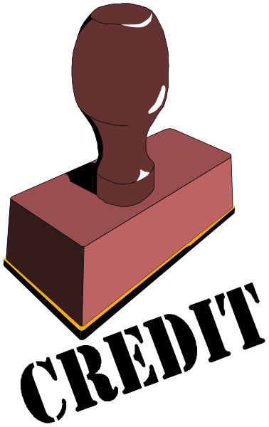 The image shows a red hammer with its head resting on top of an orange block that has two sides visible; it is set against a black background.