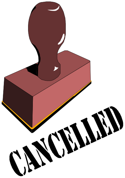 The image shows a red brick with an object on top of it that resembles a bottle opener against a black background.
