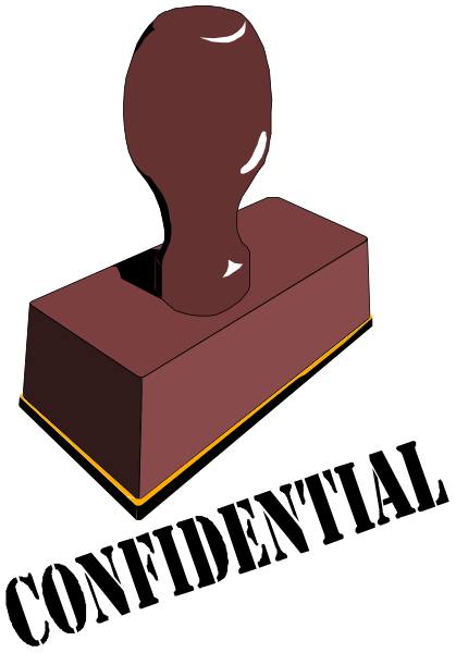 The image shows a red brick with an object on top of it against a black background.