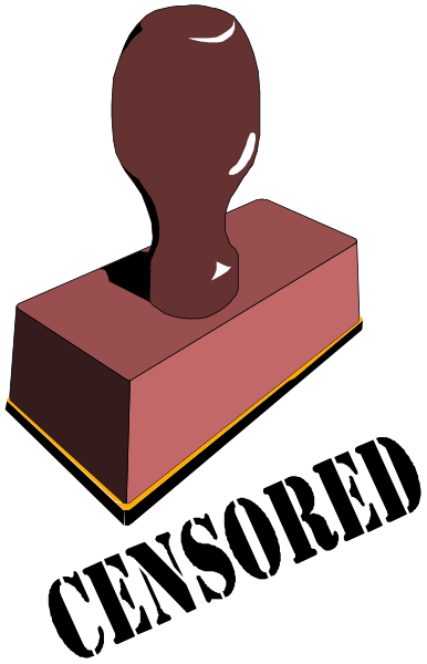 The image shows a red brick with an object on top of it that appears to be made from clay or plasticine.