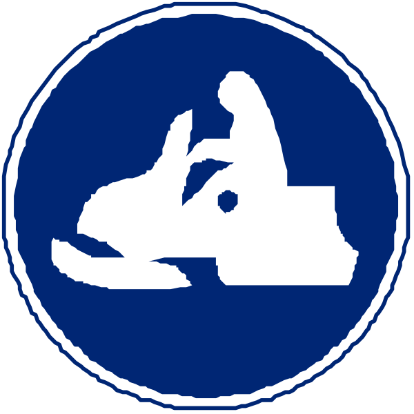 The image shows a blue sign with white symbols that represent two different types of vehicles: on top is an icon depicting what appears to be a truck (possibly indicating parking for trucks), below it there's another symbol representing a dog, which might indicate pet-friendly areas or possibly the presence of dogs in this area.